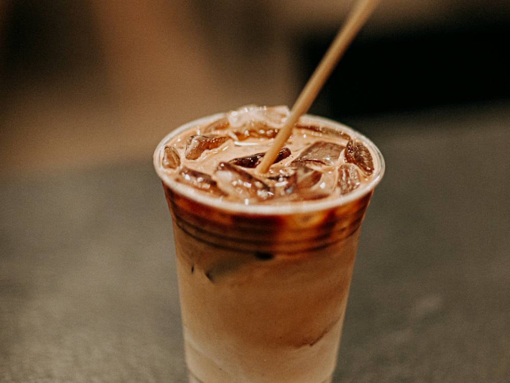 Iced coffee with a straw